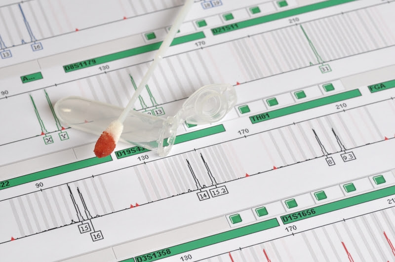 a cotton swab with a beaker